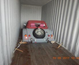 loading cars into container