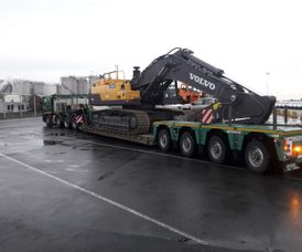excavator to port for shipment